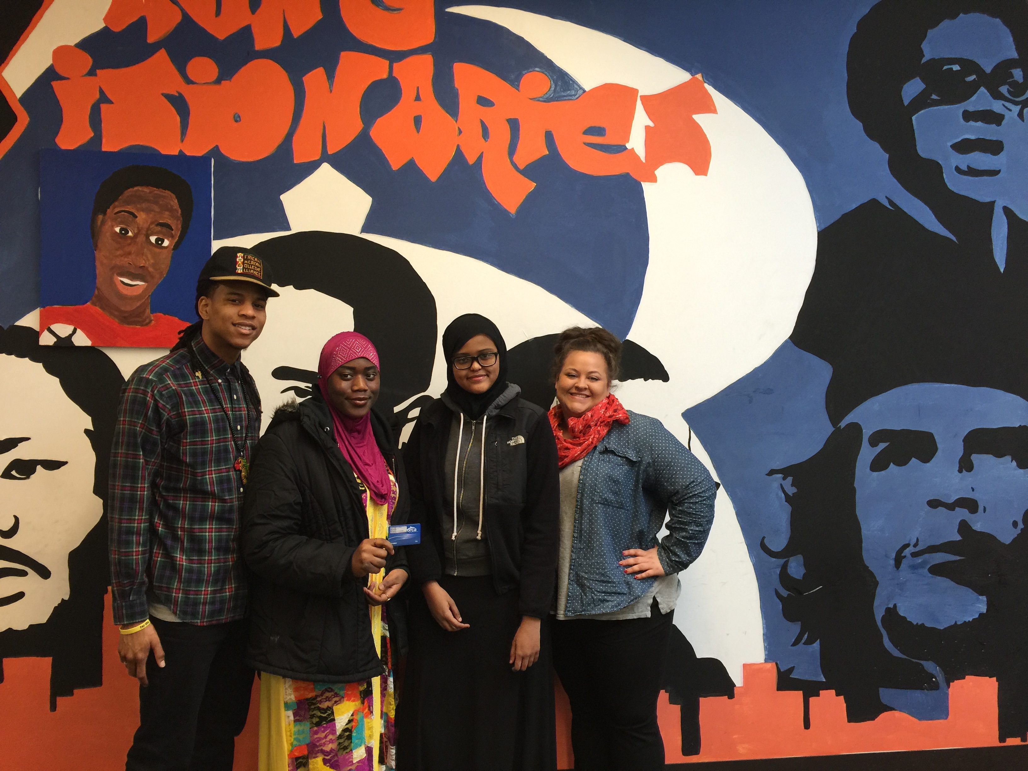 Left to Right: Poet & activist, Jerrell Davis and Rainier Beach High School students Mariam Bayo and Efra Abzir and Rainier Beach High School Social worker, Chelsea Gallegos