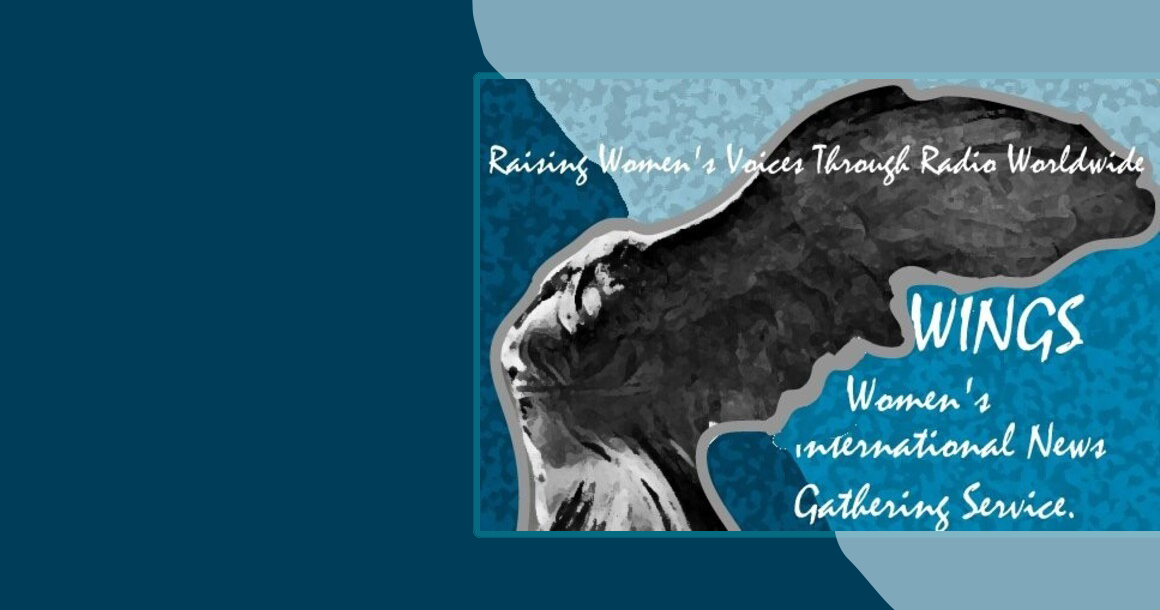 The image is a banner for WINGS (Women’s International News Gathering Service). It features an artistic depiction of a woman with wings, symbolizing the goddess Nike. The woman is shown in black and white against a textured blue and teal background, giving the image a vintage, yet powerful feel. In the top left corner, the text reads, “Raising Women’s Voices Through Radio Worldwide” in a handwritten-style font. On the right side of the image, the acronym “WINGS” is displayed in large, bold, white letters. Below it, the full name, “Women’s International News Gathering Service,” is written in a smaller, script-like font. The overall design conveys a sense of strength, movement, and global outreach, aligning with the mission of WINGS to amplify women’s voices through radio.